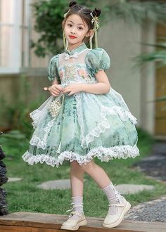 Chinese Style Green Stand Collar Embroideried Lace Patchwork Tulle Kids Long Dresses Short SleeveFabric: TulleSize Fit:Fit: This garment fits true to size.Length: Size 120 measures 72cm from shoulder to hemBust:The bust size for size 120 measures around 68cmWash: Hand Wash Cold. Spring Green Princess Dress With Short Sleeves, Green Fitted Princess Dress With Short Sleeves, Spring Green Princess Dress For Fancy Dress, Green Princess Dress For Spring Fancy Dress, Princess Style Short Sleeve Costume Dress, Short Sleeve Summer Costume Dress, Princess Style Short Sleeve Lace Dress, Summer Costume Dress With Short Sleeves, Spring Princess Dress With Lace Patchwork