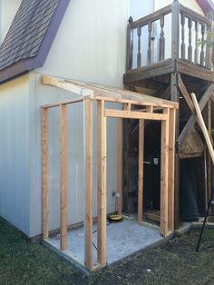 a house being built with wooden framing