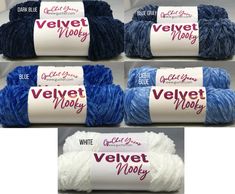 four skeins of blue and white yarn are shown in three different rows, each with the word velvet wool written on it