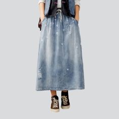 Welcome to our 2023 Spring-Summer Collection with a fashion laid-back embroidery long denim skirt. This high-waist, drawstrings closure skirt is the perfect blend of laid-back style and enduring sophistication. With its unique embroidery pattern, it's sure to make a statement!Key Highlights: Urban Embroidery: Crafted with intricate embroidery detailing, this skirt offers an effortless expression of vogue style. Long Length: The elongated length of this skirt offers a flattering silhouette, perfe