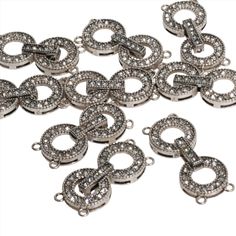 Add a dazzling focal point to your jewelry with our CL/30 Pavé Crystal Round Buckle Clasp. Measuring 35x22mm, this large, round clasp is encrusted with brilliant pavé crystals, creating a stunning display of light and luxury. Its buckle design not only serves as a secure closure but also as an elegant decorative element, making it perfect for statement necklaces and bracelets. Sold individually, this clasp is designed to bring glamour and functionality to your handcrafted jewelry pieces. Materia Classic Round Rhinestone Jewelry, Silver Jewelry With Rhinestone Round Beads, Jewelry Style, Statement Necklaces, Pitcairn Islands, Guinea Bissau, Mozambique, Caribbean Netherlands, Handcrafted Jewelry