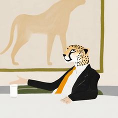 a man sitting at a table in front of a painting with a cheetah on the wall