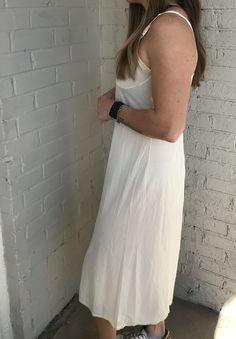 "Beautiful 60s-70s semi-sheer slip dress is cream w/ivory colored cups, lace detail, v neck, adjustable straps, midi length, stretch to material. Good preowned vintage condition. No stains or holes. Brand: Vanity Fair Machine washable Made in USA Tagged women's size: 36 B 🌼 Model is 5'4\" & measures (33/28/33)🌼 Measures: 17\" underarm to underarm* 16\" waist* 20\" hips* 44\" length ( top of shoulder strap to bottom hem) Measured lying flat *remember to double for circumference I do not shi Fitted Slip Dress For Spring Loungewear, White Fitted Maxi Dress Unlined, Fitted White Maxi Dress Unlined, White Fitted Unlined Maxi Dress, Spring Bias-cut Slip Dress For Loungewear, Beige Slip Dress For Daywear, Spring Cream Bias Cut Slip Dress, Chic White Slip Dress For Daywear, Spring Beige Maxi Dress For Loungewear