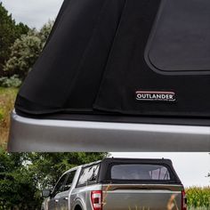 the back end of a truck with an outlander logo on it