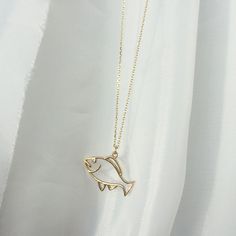 Fish Neclace 14k Solid Gold Solitaire Diamond Gemstone Fish Animal Pendant Gold Pisces Necklace Birthday Gift For Her Handmade Fine Jewelry ▶ 𝙋𝙍𝙊𝘿𝙐𝘾𝙏 𝙁𝙀𝘼𝙏𝙐𝙍𝙀𝙎 * 14k Solid Gold Necklace * Total Carat: 0.01 ct * Diamond Quality: G Colour VS Clarity * Total Numbers Of: 1 * Fish Width: 2 cm ( 0.78 inches) * Fish Length: 1.50 cm ( 0.59 inches) ❤️Fish Symbol Meaning The Pisces symbol meaning is known as the last zodiac sign in the horoscope rating. It symbolizes the primacy of all zodia Elegant 14k Gold Fish-shaped Jewelry, Elegant Fish-shaped Formal Jewelry, Elegant Yellow Gold Fish Shaped Necklace, Gold Fish-shaped Necklace For Gift, Pisces Necklace, Fish Animal, Minimalist Diamond Rings, Ocean Necklace, Fish Necklace