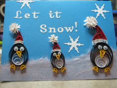 three penguins wearing hats and snowflakes are standing in front of a sign that says let it snow