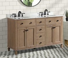 a bathroom vanity with two sinks and a mirror on the wall next to a tiled floor