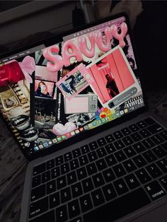 an open laptop computer sitting on top of a table