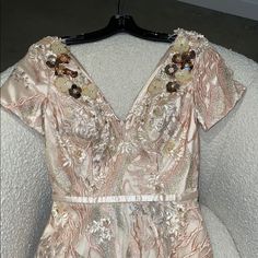 Stunning Pink And Gold W Floral Appliqu Size 4 Nwt , Never Worn Purchased Directly From Vendor (Online) Saks Carries This Designer Pink V-neck Cocktail Evening Dress, Floral Embellished V-neck Evening Dress, Pink Floral Embellished Evening Dress, Pink Short-sleeved Evening Dress For Wedding, Pink Short Sleeve Evening Dress For Wedding, Pink Floral Evening Dress, Pink V-neck Sequin Evening Dress, Luxury Embellished Pink Dress, Luxury Pink Embellished Dresses