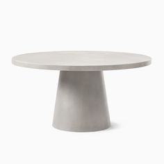 a white table with a round top