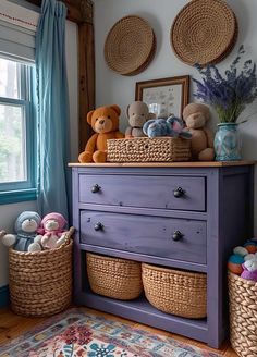 a dresser with baskets and stuffed animals on top