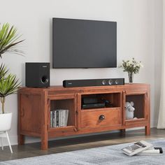 the entertainment center is made out of wood