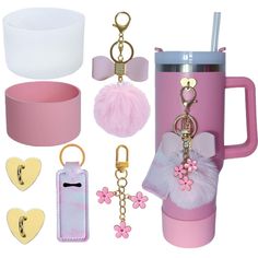 a pink coffee cup with keychain and other accessories