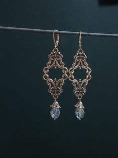 These dangle,chandelier Edwardian style earrings whit swarovski beads are sure to nice accent any of your favourite style outfits and Victorian/Gothic wedding.       Thank you for visiting my shop! Victorian Gothic Wedding, Wedding Earrings Silver, Earrings Gothic, Victorian Earrings, Earrings Chandelier, Edwardian Style, Gothic Accessories, Swarovski Beads, Filigree Earrings