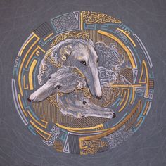 two dogs are depicted in an intricately designed circle with gold and blue designs on it