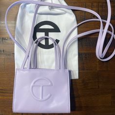 Adorable Tote Bag That Can Be Worn As A Crossbody In Beautiful Lavender! It’s Good As New, Was A Little Too Small For Me So I Never Really Used It. Currently Sold Out Online. Comes From A Smoke Free Home! Purple Telfar Bag Outfit, Gray Telfar Bag, Lavender Telfar Bag, Telfar Small Shopping Bag, Versatile Purple Tote Shoulder Bag, Shopping Tote, Small Shop, Bag Lady, Tote Bag