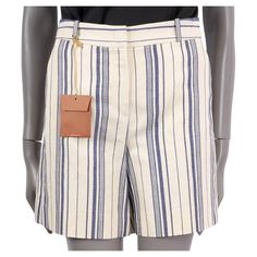 100% authentic Loro Piana striped shorts in beige and blue cotton (51%), hemp (44%) and nylon (55%). Feature belt loops, two slit pockets on the front and two pockets at the back. Open with a concealed zipper, button and a hook on the front. Unlined. Has been worn and is in virtually new condition. Comes with extra button. Measurements Tag Size 38 Size XS Waist From 36cm (14in) Hips From 84cm (32.8in) Length 41cm (16in) Inseam 16cm (6.2in) All our listings include only the listed item unless oth Loro Piana, Striped Shorts, Short Pants, Short Outfits, Cotton Linen, Bermuda Shorts, Fashion Outfits, Zipper, Crochet