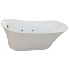 a white bath tub sitting on top of a white counter next to a wall mounted faucet