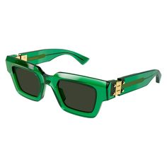 Introducing the Bottega Veneta BV1230S 002 Transparent Green/Dark Green sunglasses, a sleek and sophisticated accessory perfect for the modern man who values style and quality. Crafted by the renowned luxury brand Bottega Veneta, these sunglasses exude elegance and sophistication, making them the perfect addition to any fashion-forward wardrobe. The frame color of these sunglasses is a stunning Transparent Green, creating a unique and eye-catching look that is sure to turn heads. Paired with Dar Bottega Veneta Logo, Green Sunglasses, New Bottega, Ring Watch, Rectangular Sunglasses, Rectangle Sunglasses, Pendant Rings, Square Frame, Luxury Shop