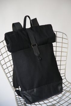 Black Laptop Backpack - Black Leather Backpack - Vegan backpack - Rolltop Backpack - Minimalist Backpack - Big laptop Rucksack - Travel Backpack - Back to School - Big Black Bag, Black Backpack, Black Leather Bag, Laptop Backpack, Black Canvas Bag, Black Rolltop Bag, Travel Backpack,School Backpack - Made to order - allow 7 days to create it for you - Original pattern and design - Handmade by me with care and love - Made from Sturdy black drill fabric and black faux leather fabric, the lining is Practical Black Backpack For On-the-go, Practical Black Everyday Backpack, Functional Black Leather Backpack For On-the-go, Practical Black Backpack For Everyday, Black Canvas Backpack With Leather Handles, Modern Black Backpack For On-the-go, Modern Black Backpack For Everyday Use, Black Rectangular Canvas Backpack, Black On-the-go Standard Backpack