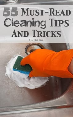 a person in orange gloves cleaning a sink with a rag on it and the words 75 must - read cleaning tips and tricks