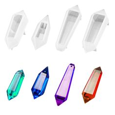 six different colors of crystal stones on a white background