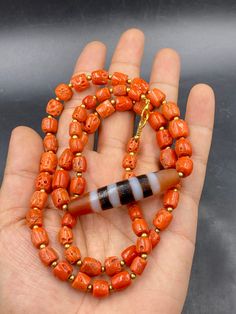 Excellence quality natural coral bead strand with 4 stripe antique dzi agate bead necklace Traditional Orange Single Strand Jewelry, Carved Amber Round Beads Jewelry, Antique Orange Beaded Jewelry, Antique Orange Jewelry With Round Beads, Natural Coral, Coral Jewelry, Coral Beads, Beaded Necklaces, Agate Beads