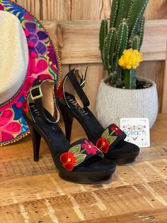 Treat yourself to these beautiful Embroidered Suede Mexican heels. These are the highest quality in Artisanal shoes. They are completely made by hand and feature a gorgeous floral embroidered design on the strap and on the heel, making them one of a kind! These beautiful shoes can be worn with a dress or with jeans, either way you will look stylish and unique! Heel height: 4 inches Platform Height: 1 inch Details: Buckle Closure Please note: You may exchange your shoe size. If you need to exchan Embroidered Round Toe Sandals For Party, Party Heels With Floral Embroidery And Round Toe, Embroidered High Heel Sandals For Party, Traditional Open Toe Heels With Floral Embroidery, Traditional Summer Heels With Floral Embroidery, Traditional Heels With Floral Embroidery For Summer, Traditional High Heel Spring Heels, Traditional Floral Embroidered Summer Heels, Traditional High Heels For Spring