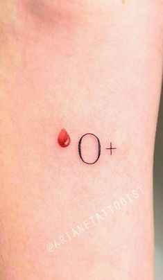 a person with a red dot on their left side of the leg and an o symbol