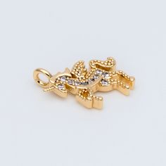 ★ High quality real gold plated brass charms, cubic zirconia paved, color not easily tarnish, lead nickel free ★ Size: 13x11mm, loop size 1.5mm (see Pic 2) Material: real gold plated brass, cubic zirconia Quantity: 8pcs Color: gold ❤ More gold plated brass items here: ❤ https://www.etsy.com/shop/Nbeads?search_query=GB ❤ More metal findings(brass, silver, alloy etc.) here: ❤ https://www.etsy.com/shop/Nbeads?section_id=6656259 Gold Charm Necklace With Cubic Zirconia, Gold Cubic Zirconia Pendant Charms, Gold Whale, Brass Items, Unicorn Charm, Brass Charms, Beautiful Heart, Blue Heart, Silver Heart