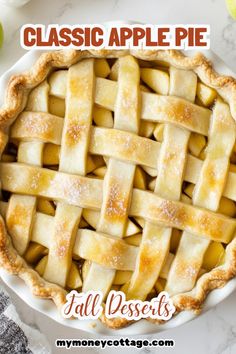 an apple pie with the words classic apple pie written above it and apples in the background