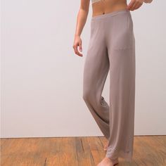 Soma Model Pull On Ribbed Pants With Lace Bottom. The Incredibly Soft Modal Silky Fabric Is Designed To Keep You Comfy While Sleeping Or Lounging With A Stretch That Moves With You. In Addition, It Has A Beautiful Drape And Is Wrinkle-Resistant So You'll Always Look Fresh. Pants Details: Ribbed Detail Lace Detail Front Pockets Flat Waistband 30" Inseam. 93% Rayon, 7% Spandex. Modal Blend. Machine Wash. Imported. Color: Smokey Taupe Msrp: $59 Brand New With Tags Factory Sealed I Seamless Stretch Bottoms For Lounging, Spring Yoga Pants For Lounging, Seamless Stretch Bottoms For Relaxation, Stretch Loungewear Bottoms With Soft Touch, Stretch Soft Touch Bottoms For Loungewear, Comfortable Full Length Sleep Bottoms, Comfortable Seamless Bottoms For Loungewear, Stretch Soft Touch Pants For Loungewear, Full Length Pants For Relaxation