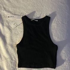 Nwt Zara Basic Black Crop Tank Size Small New W Tags Black Basic Tank Top For Summer, Basic Black Summer Tank Top, Basic Black Tank Top For Summer, Zara Basic Stretch Crop Top, Basic Black Tank Top For Spring, Basic Black Spring Tank Top, Zara Black Stretch Crop Top, Zara Sleeveless Black Crop Top, Fitted Black Zara Tank Top