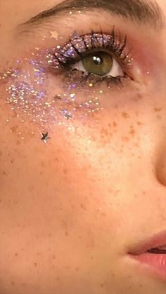 Glitter Makeup Concert, Taylor Swift Face Glitter, Sparkly Face Makeup, Folklore Eye Makeup, Star Around Eye Makeup, Gold Star Eye Makeup, Concert Makeup Looks Glitter, Glitter Star Makeup, Euphoria Makeup Hooded Eyes