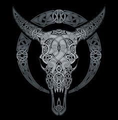 a bull skull with intricate patterns on it's face in the middle of a black background