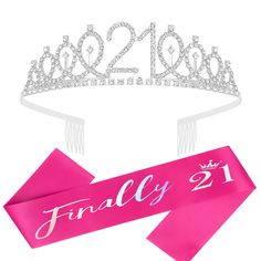 a tiara and ribbon with the number twenty two on it, next to a pink sash