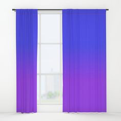 an open window with pink and blue ombreed curtains in front of the window