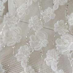 * * * * * * N o t e * * * * * * If you choose express shipping, contact number is a MUST for shipping, please leave it with orders, Thank you. * * * Thank you for visiting our shop and happy crafting! Elegant 3D Flower Beaded Bridal Dress Fabric Wedding Gown DIY Tulle Trim For or Bridal Dress, Evening Gown 51 inches Width Sold By Yard * * * * * * S i z e * * * * * * Width - 51 Inches ( 130 cm ) * * * * * C o l o r * * * * *  Ivory * * * * Ｑ u a n t i t y * * * * This listing is for 1 yard, if yo Diy Tulle, Dolls Outfits, Romantic Lace, Wedding Fabric, Dress Evening, Dress Prom, Bridal Wedding Dresses, Bridal Dress, Gown Wedding Dress