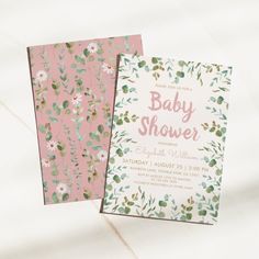 two baby shower cards sitting next to each other