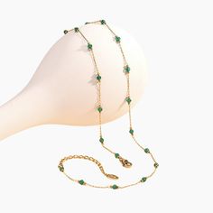 Elevate your jewelry collection with our exquisite Dual-Color 18K Gold-Plated Crystal Bead Necklace. This elegant piece features a stunning combination of vibrant emerald and deep black crystals, interspersed with gleaming gold beads. Choose between the lush greens of emerald or the bold allure of black for a versatile accessory that adds a touch of luxury to any look. Key Features: - 18K Gold Plating: Each necklace is meticulously plated with 18K gold for a rich, long-lasting shine. - Premium Crystals: Hand-selected emerald and black crystals ensure maximum sparkle and clarity. - Interspersed Design: Gold beads are strategically placed between crystal beads for a visually striking effect. - Versatile Choice: Perfect for both formal events and everyday wear, this necklace is a timeless add Round Green Emerald Necklace With Jewels, Green Emerald Necklace With Adjustable Chain, Emerald Green Jeweled Necklace For May Birthstone, Gold Emerald Necklaces With Gemstone Beads, Green Emerald Jewelry With Adjustable Chain, Emerald Jewelry With Adjustable Green Chain, Gold Emerald Necklace With Gemstone Beads, Fine Jewelry With Green Clavicle Chain, Green Fine Jewelry Collar Necklace