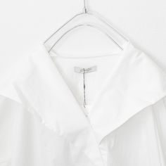 Big collar back flap short sleeve shirt. Ship from Japan Imported Limited stock (One Size)length 75cm/81cmwidth 65cm 60% cotton 34% nylon 6% polyurethane Summer White Shirt With Cuffed Sleeves, White Shirt With Cuffed Sleeves For Summer, Relaxed Fit Blouse With Fold Down Collar For Summer, Summer Blouse With Relaxed Fit And Fold Down Collar, Short Sleeve Shirt With Cuffed Sleeves For Work, Short Sleeve Tops With Cuffed Sleeves For Work, Relaxed Fit Short Sleeve Shirt With Cuffed Sleeves, Fitted Short Sleeve Shirt With Cuffed Sleeves, Spring Shirt With Cuffed Short Sleeves