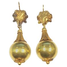 Circa 1880 Etruscan Revival Earrings, testing as 14k - 15k Gold, Large articulated and Impressive, measuring 2 1/8 inches in length with the bottom ball portion measuring 5/8 inch in diameter. The tops are a phenomenal well detailed Dimensional Rams Head. Exceptional excellent condition overall. Antique Yellow Gold Earrings For Formal Events, Antique Yellow Gold Earrings For Formal Occasions, Elegant Yellow Gold Earrings With Historical Design, Victorian 14k Gold Earrings, Formal Drop Earrings With Historical Design, Victorian Engraved Earrings For Formal Occasions, Victorian Baroque Earrings For Formal Occasions, Victorian Gold Earrings For Formal Occasions, Victorian Baroque Earrings