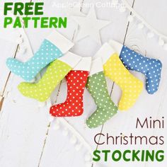 an image of christmas stockings made out of fabric on a white wooden background with free pattern