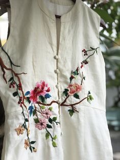 ❤ The beige linen hand embroidered dress is very soft, skin friendly, breezy and comfortable.  ❤ Item description: - A lovely dress with embroidered bird and flowers motifs. - Material: linen, buttons, embroidery threads. - Environmentally friendly. - This dress is very useful, go with any outfit, that can be used to go to school, go out, go shopping.    It is a perfect gift for yourself or your beloved.  ❤ Care instructions:       The best way to wash embroidery cloth is to put it in soapy water (with a mild detergent and cold water at 86 ºF/30oС) for 20 minutes. Try to not wash the item with other clothing that might cause damage, such as zippers, buttons or different colors. You wash it by hand, and if you have dirty patches on your garment, you can gently rub them, it's best not to rub Casual Floral Embroidery Dress, Casual Cotton Embroidered Dress, Spring Embroidered Cotton Dress, Cheap Cotton Embroidered Dress With Short Sleeves, Cheap Embroidered Women's Dresses, Cheap Embroidered Hem Dress For Summer, Luxury Cotton Embroidered Summer Dress, Cheap Embroidered Dresses For Women, Cheap Cute Embroidered Dresses