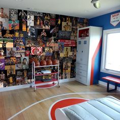 a basketball themed bedroom with pictures on the wall