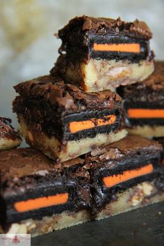 several pieces of brownie with orange and black stripes