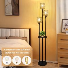 a lamp that is on top of a stand next to a bed in a room