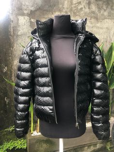 WINTER COLLECTION 2020/2021 Snakeskin DUCK DOWN Jacket for women. A jacket made from genuine python leather. Removable hood. Outside: GENUINE PYTHON LEATHER Inside: DUCK DOWN 100% Accessories: silver color (please see the photo). Lining: MONCLER All our products are 100% handmade, we always try to create interesting ideas to make your style unique. We use only the highest quality materials and accessories from around the world and only best leather from Indonesia. Before listing each new model u Luxury Black Puffer Jacket With Zipper Closure, Luxury Black Hooded Puffer Jacket, Luxury Hooded Puffer Jacket With Zipper Closure, Luxury Hooded Puffer Jacket For Streetwear, Luxury Puffer Jacket With Double-lined Hood, Luxury Fall Puffer Jacket With Double-lined Hood, Luxury Quilted Hooded Outerwear, Luxury Black Hooded Leather Jacket, Luxury Puffer Jacket For Outdoor Fall Use