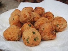 a pile of fried food sitting on top of a white napkin