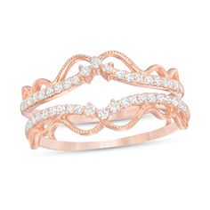 a rose gold ring with white diamonds